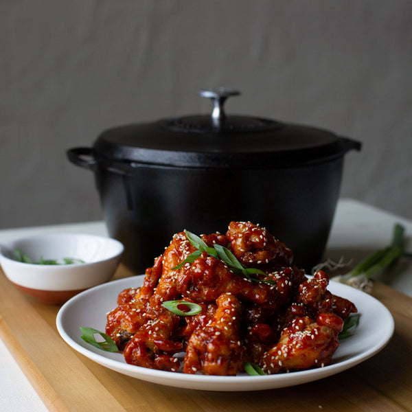 Chicken wings cooked in a Lodge Blacklock 5.2L Dutch oven